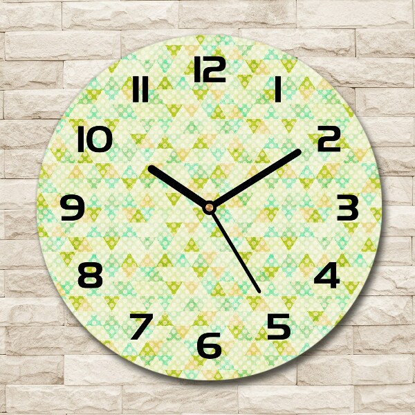 Orologio rotondo in vetro con sfondo geometrico
