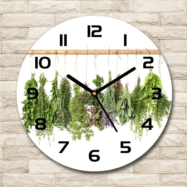 Orologio da parete rotondo con decorazione a motivo di erbe aromatiche su fondo chiaro
