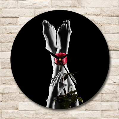 Orologio da parete rotondo con quadrante rosa e con piedini di supporto