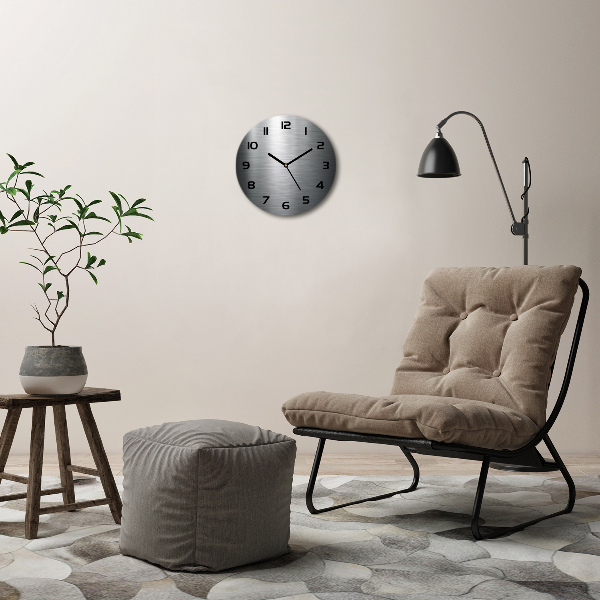 Orologio rotondo con sfondo metallico