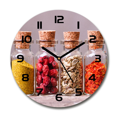 Orologio rotondo con quadrante decorato con motivi di spezie colorate