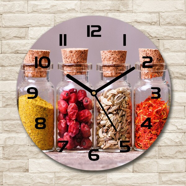 Orologio rotondo con quadrante decorato con motivi di spezie colorate