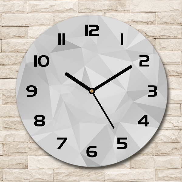 Orologio da parete rotondo con motivo a triangoli astratti