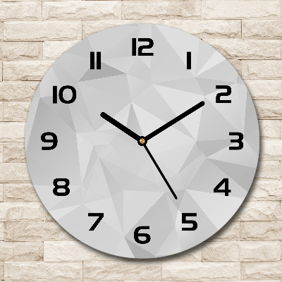 Orologio da parete rotondo con motivo a triangoli astratti