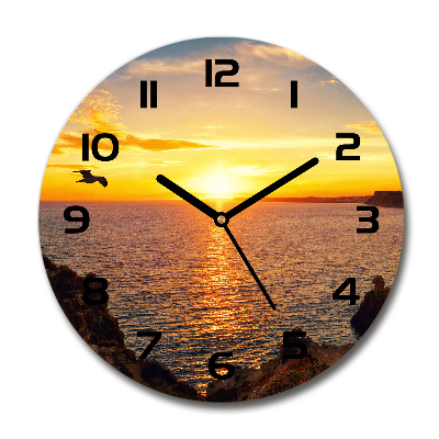 Orologio da parete rotondo con motivo mare al tramonto