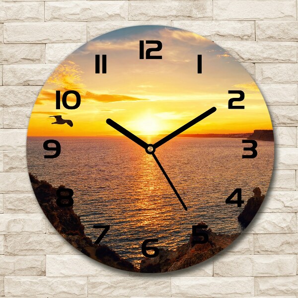 Orologio da parete rotondo con motivo mare al tramonto