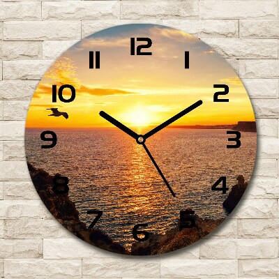Orologio da parete rotondo con motivo mare al tramonto