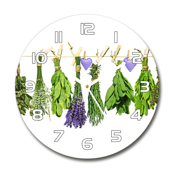 Orologio rotondo in vetro con motivo di erbe aromatiche su un filo