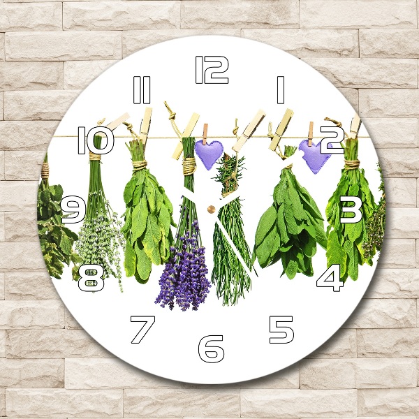 Orologio rotondo in vetro con motivo di erbe aromatiche su un filo