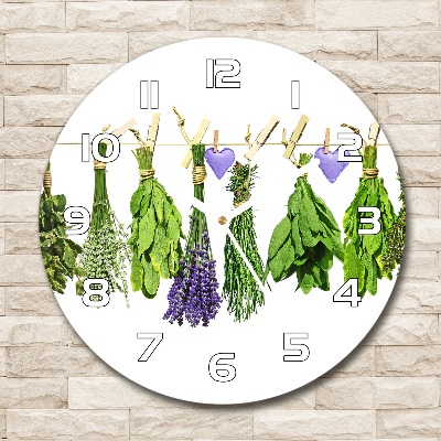 Orologio rotondo in vetro con motivo di erbe aromatiche su un filo