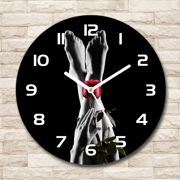 Orologio rotondo in vetro con quadrante rosa e piedi di supporto