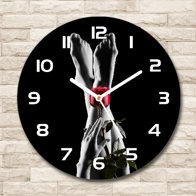 Orologio rotondo in vetro con quadrante rosa e piedi di supporto