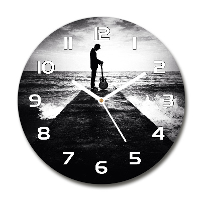 Orologio rotondo in vetro con decorazione raffigurante un chitarrista su un molo