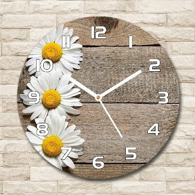 Orologio rotondo con motivo di margherite su sfondo boschivo