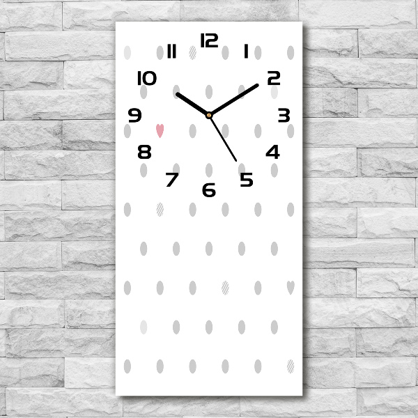 Orologio verticale con quadrante decorato da motivi a punti e cuori