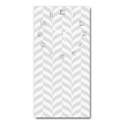 Orologio da parete verticale con motivo geometrico sullo sfondo