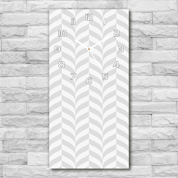 Orologio da parete verticale con motivo geometrico sullo sfondo