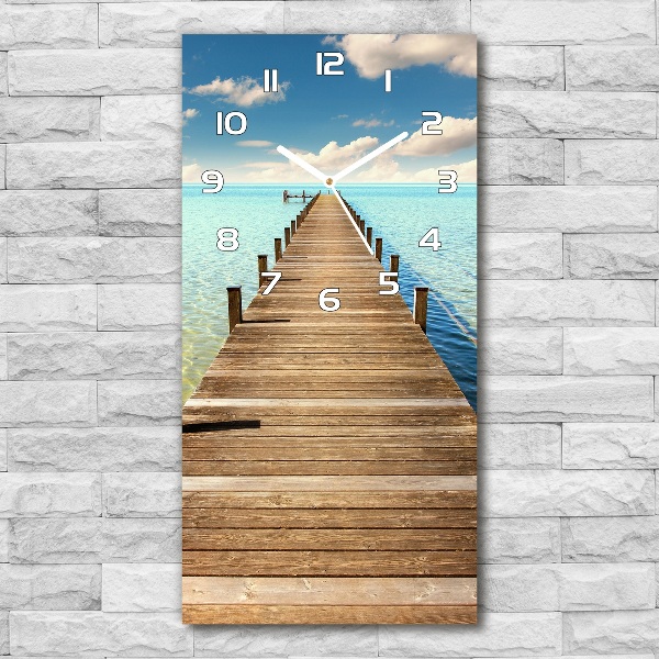 Orologio verticale in vetro con molo in legno come decorazione