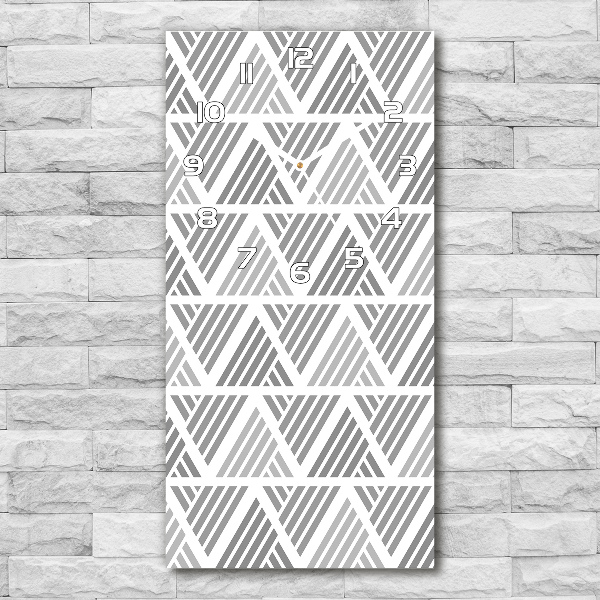 Orologio verticale con sfondo geometrico