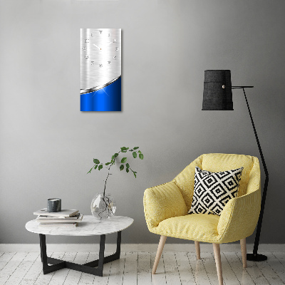 Orologio da parete verticale con motivo astratto metallico