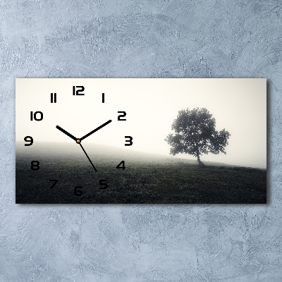 Orologio orizzontale con decorazione raffigurante un albero solitario