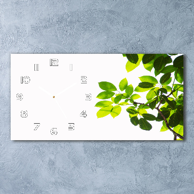 Orologio rettangolare con quadrante decorato da foglie