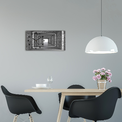 Orologio rettangolare con quadrante che riproduce un tunnel di mattoni