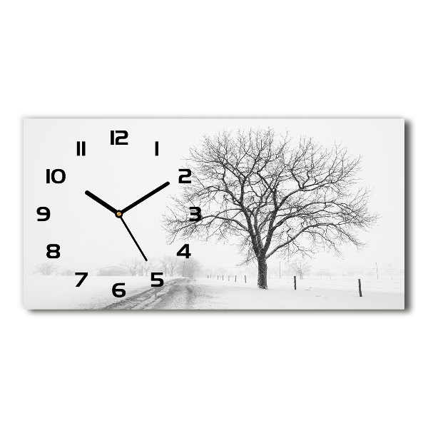Orologio orizzontale con decorazione raffigurante un albero in inverno