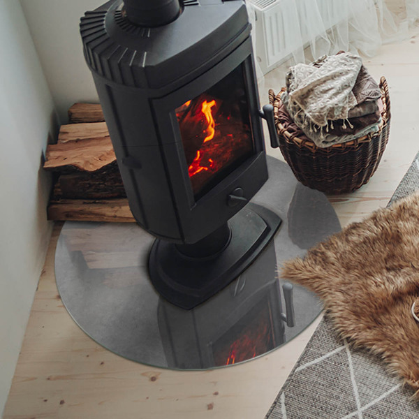 Vetro sotto il camino rotondo con texture effetto cemento