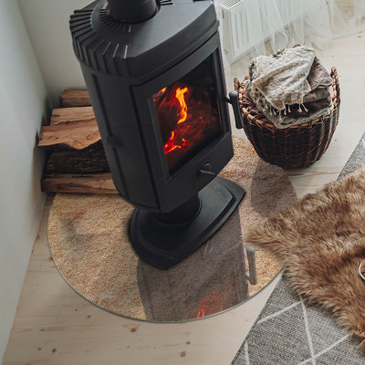 Vetro sotto il camino rotondo con texture in pietra naturale