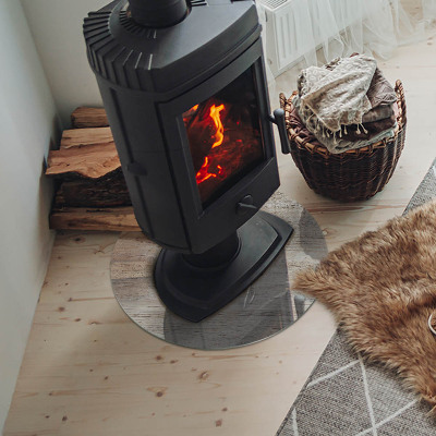 Vetro sotto il camino rotondo con venatura del legno chiaro