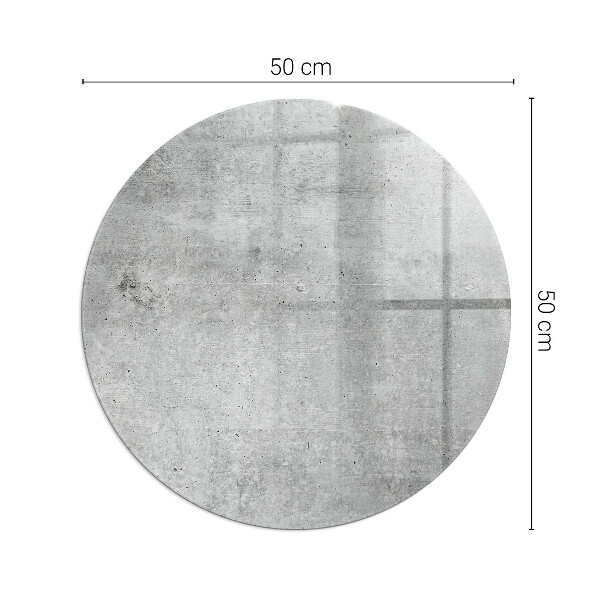 Vetro sotto il camino con struttura in calcestruzzo grezzo