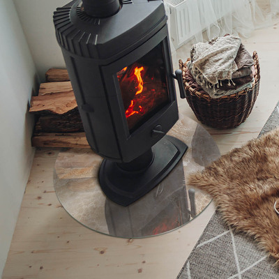 Vetro sotto il camino rotondo con motivo in pietra naturale