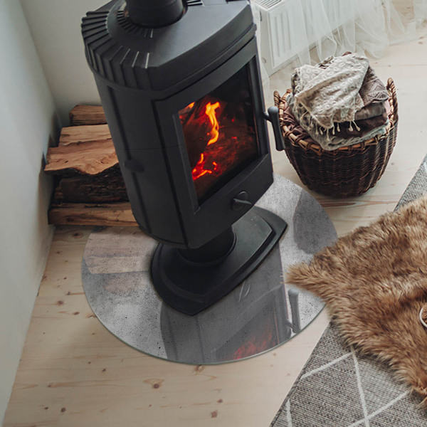 Vetro sotto il camino con struttura in calcestruzzo grezzo