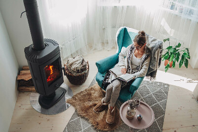 Vetro sotto il camino rotondo con un elegante motivo a piante