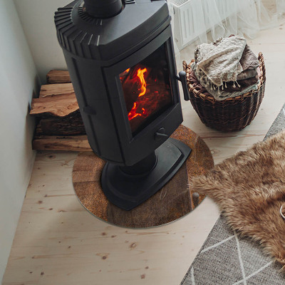 Vetro sotto il camino rotondo con texture ruggine sullo sfondo