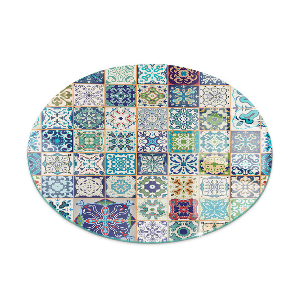Vetro sotto il camino Motivi a mosaico sulle piastrelle