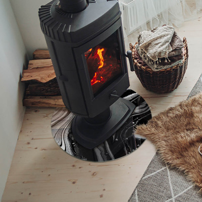 Vetro sotto il camino con motivo di onde e linee astratte