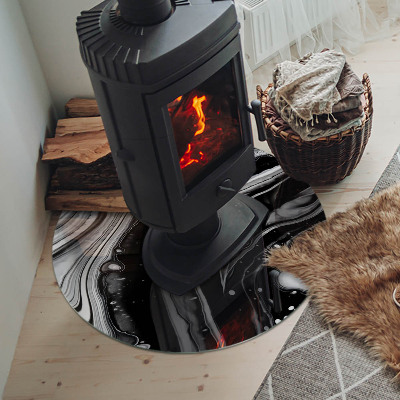 Vetro sotto il camino con motivo di onde e linee astratte