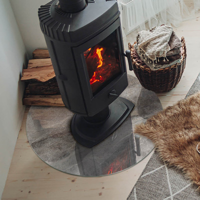 Vetro sotto il camino rotondo con motivo in pietra naturale