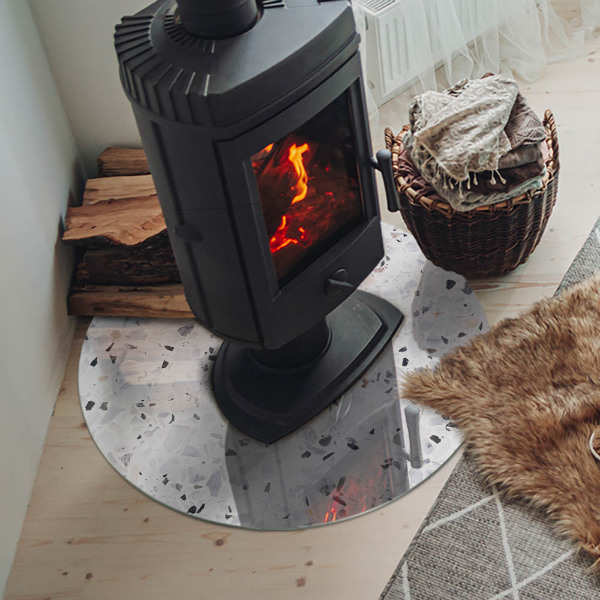 Vetro sotto il camino con motivo a pietra e particelle decorative