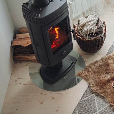 Vetro sotto il camino rotondo in colore grigio-verde