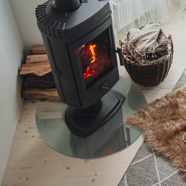 Vetro sotto il camino rotondo in colore grigio-verde