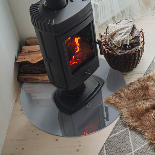 Vetro sotto il camino rotondo in colore grigio