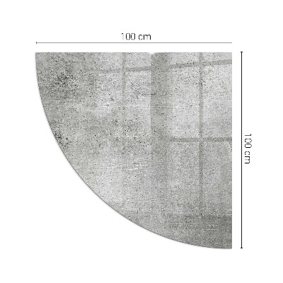Vetro sotto il camino a quarto di cerchio con finitura in cemento grezzo in stile minimalista