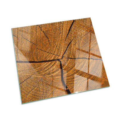 Vetro sotto stufa rettangolare Una sezione trasversale del legno con venature ben definite.