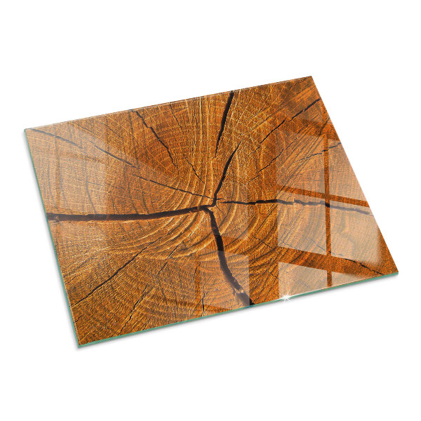 Vetro sotto stufa rettangolare Una sezione trasversale del legno con venature ben definite.