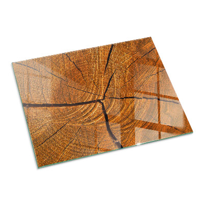 Vetro sotto stufa rettangolare Una sezione trasversale del legno con venature ben definite.