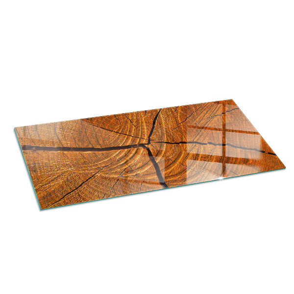 Vetro sotto stufa rettangolare Una sezione trasversale del legno con venature ben definite.