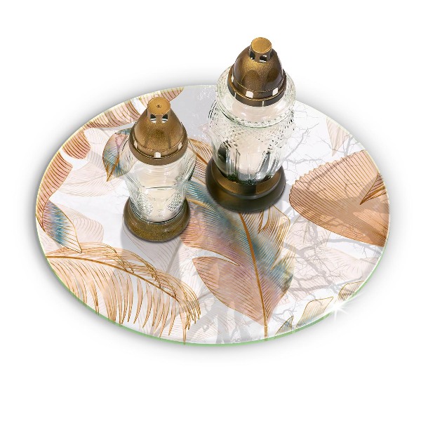 Piatto in vetro per candele con decorazione di piume e foglie in stile boho